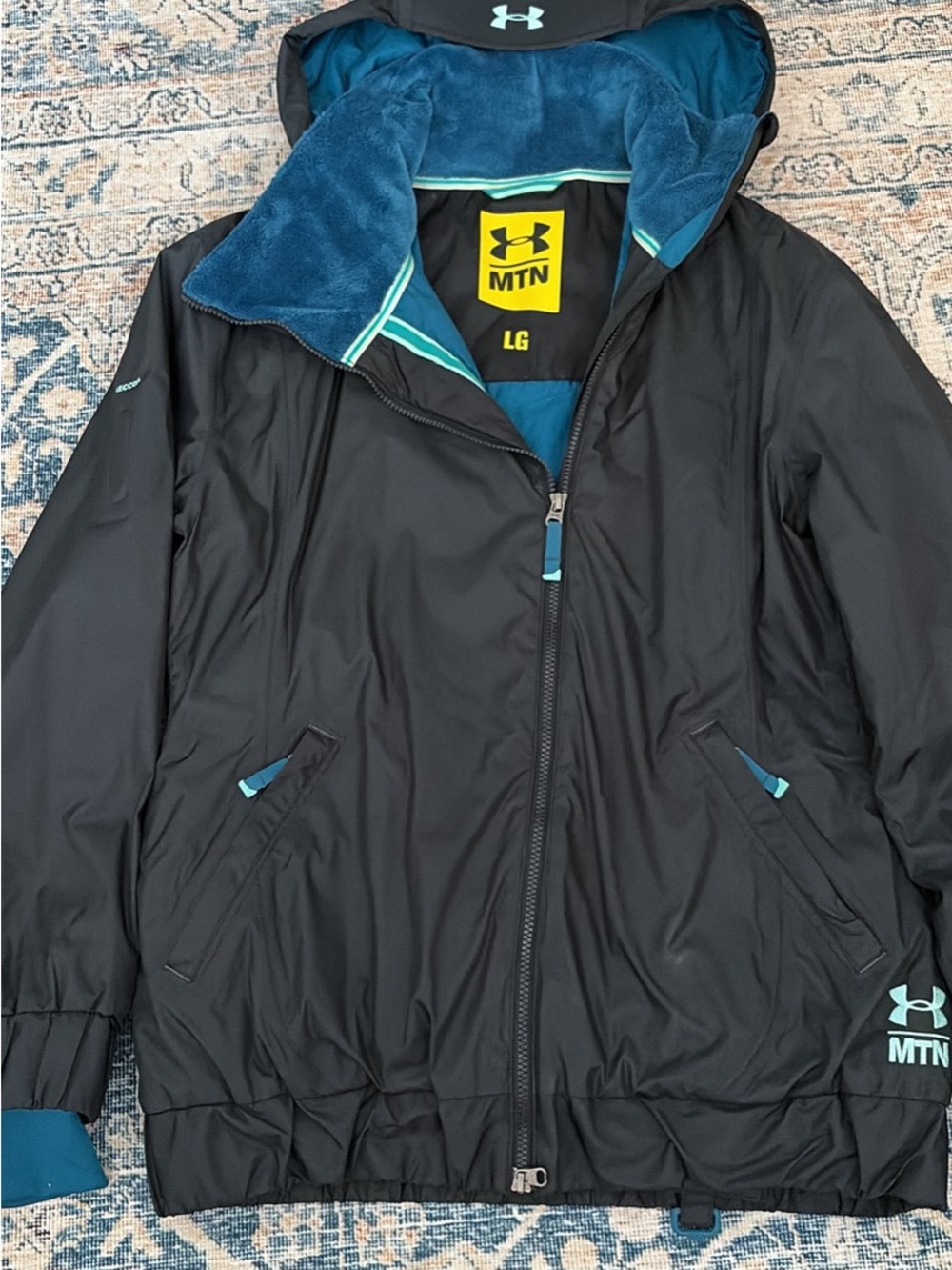 Under Armour Black Raincoat with Teal Accents